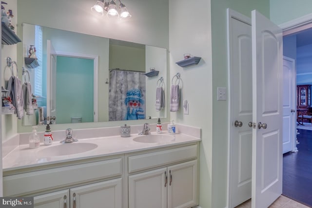 bathroom featuring walk in shower, vanity, and toilet