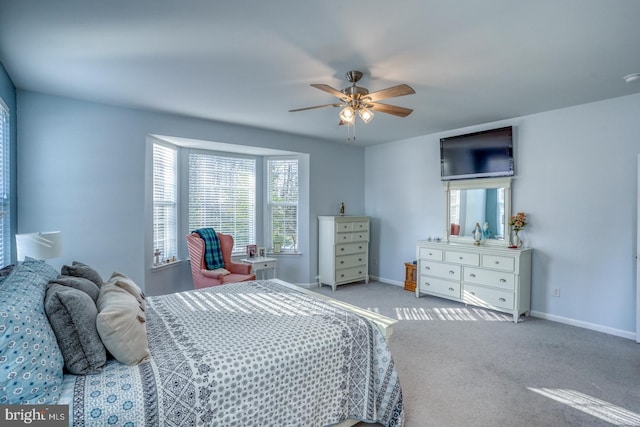 bedroom featuring ceiling fan and carpet floors