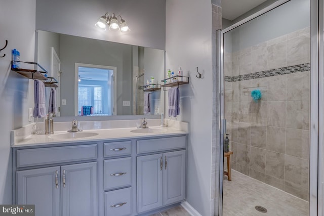 bathroom with vanity and walk in shower