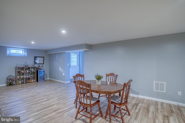 dining area with light wood-type flooring