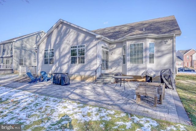 rear view of property with a patio area