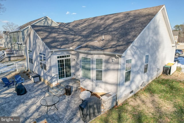 rear view of property with a patio