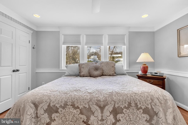 bedroom featuring a closet and ornamental molding