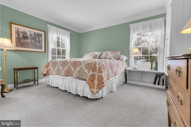 carpeted bedroom featuring ornamental molding