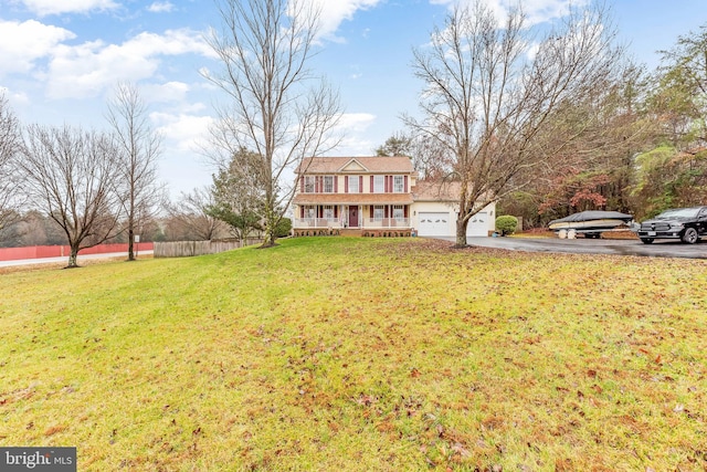 view of front facade with a front lawn and a garage