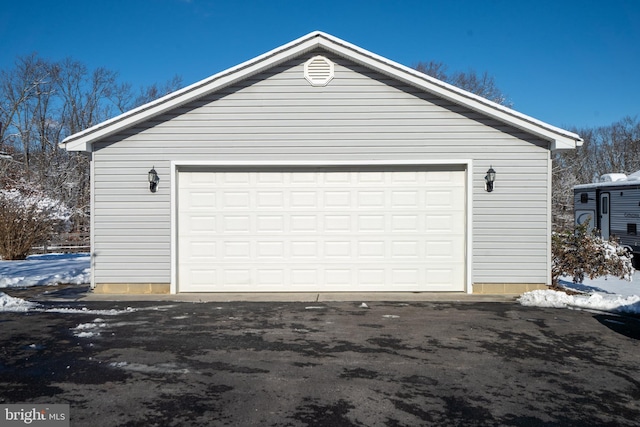 view of snow covered garage