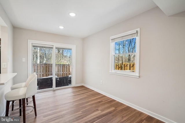 unfurnished dining area with hardwood / wood-style floors