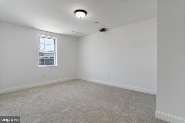 view of carpeted spare room