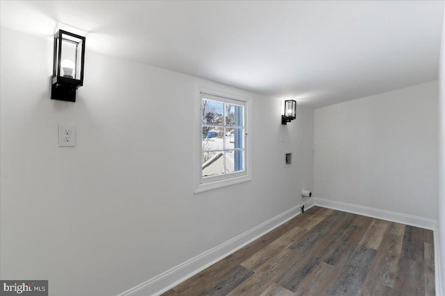 clothes washing area featuring hookup for a washing machine and dark hardwood / wood-style floors