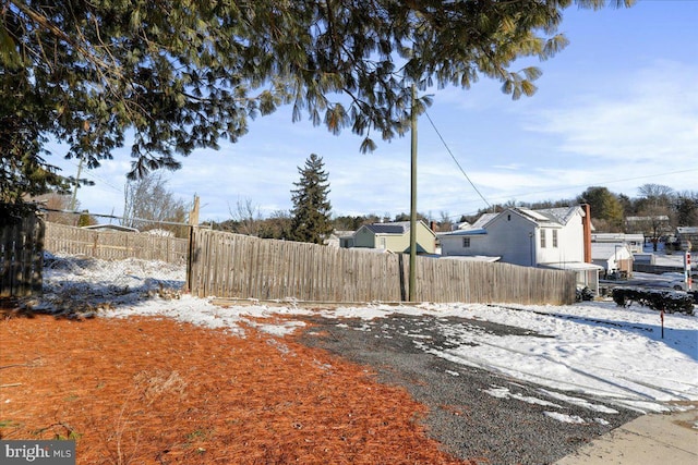 view of yard covered in snow