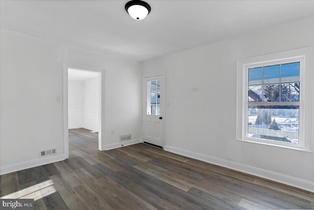 foyer featuring dark hardwood / wood-style floors