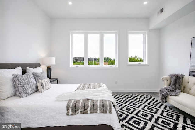 bedroom featuring wood-type flooring