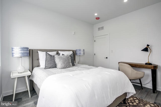 bedroom with wood-type flooring