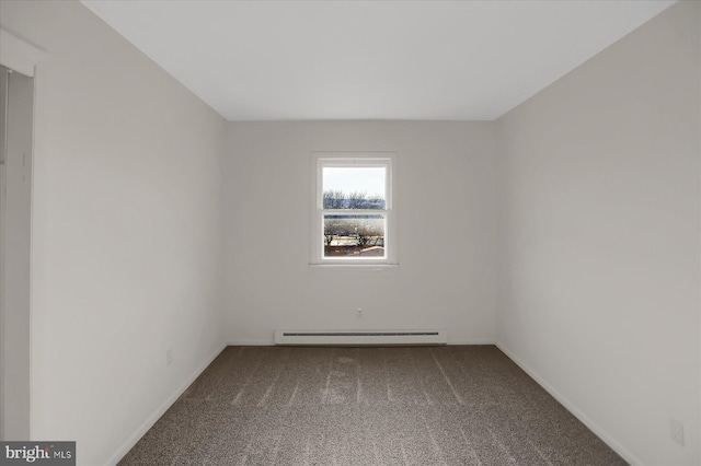 unfurnished room with baseboard heating and carpet flooring