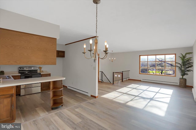 kitchen with a notable chandelier, stainless steel range with electric cooktop, decorative light fixtures, and a baseboard radiator