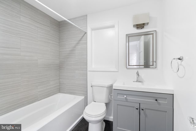 full bathroom featuring toilet, vanity, and bathtub / shower combination