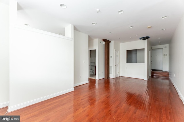 spare room featuring hardwood / wood-style flooring