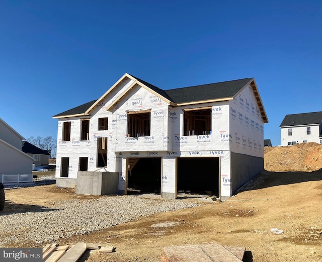 property under construction with a garage