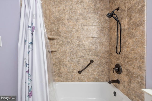 bathroom featuring shower / bath combo with shower curtain