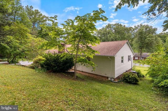 115 Woodland Rd, Fredericksburg, VA 22401 - view of side of home with a yard and roof with shingles