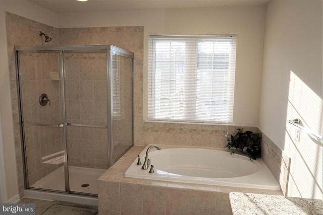 bathroom with independent shower and bath