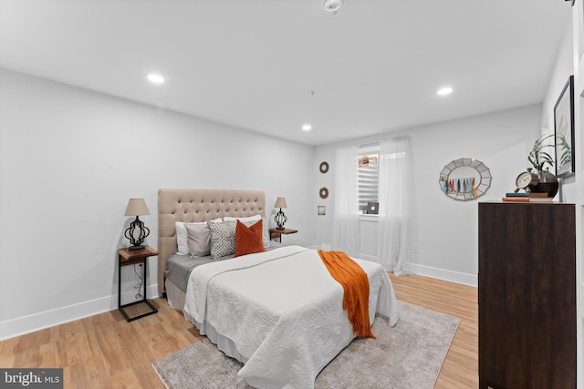 bedroom featuring light wood-type flooring