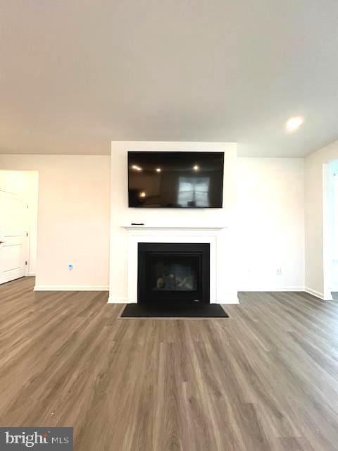 details with hardwood / wood-style flooring