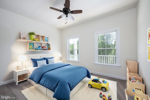 carpeted bedroom with ceiling fan