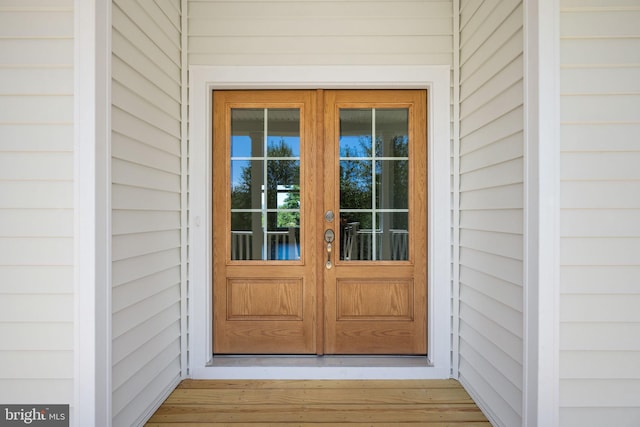 entrance to property featuring french doors