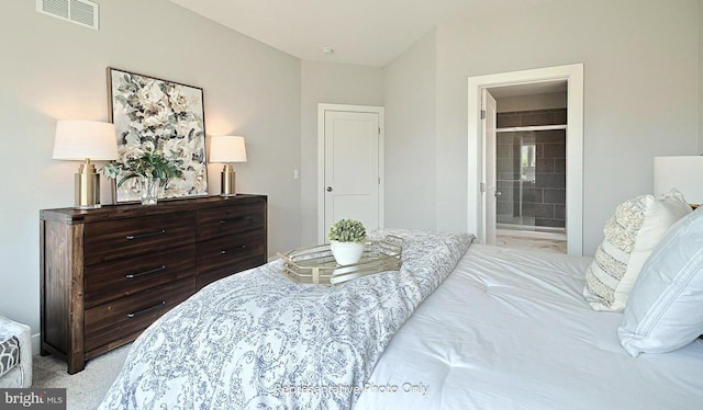 carpeted bedroom featuring connected bathroom