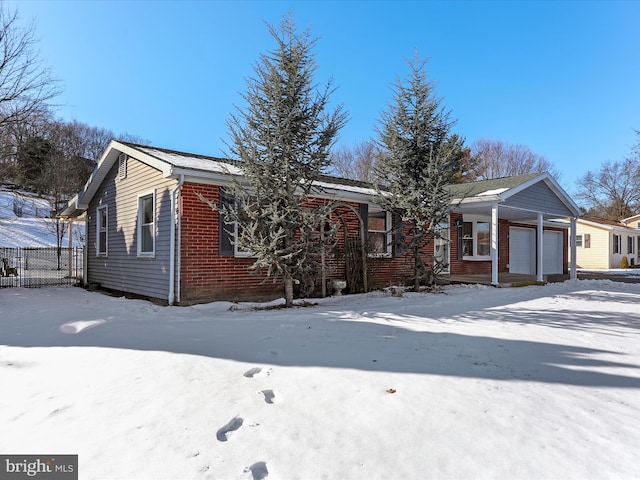 view of front of home featuring a garage