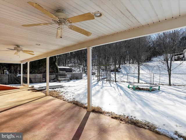 view of snow covered patio