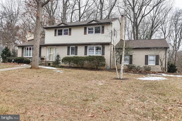 view of front property with a front lawn