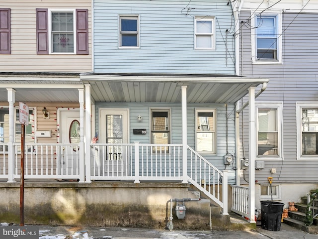 entrance to property with a porch