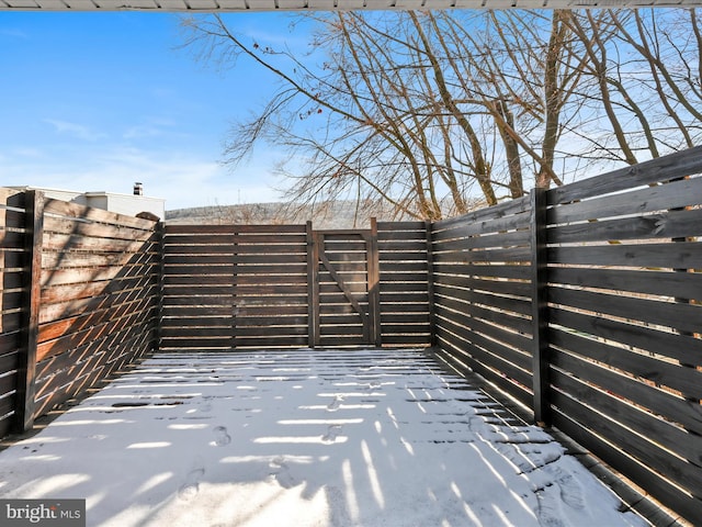 view of snow covered patio