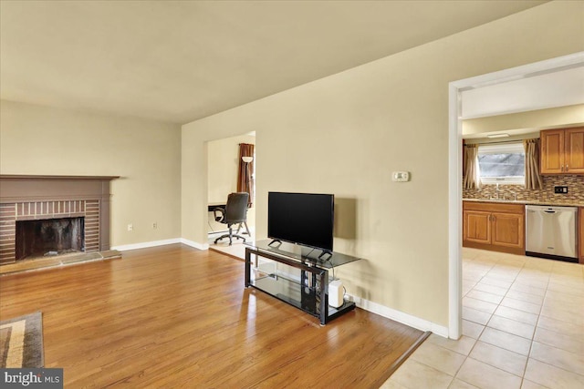 tiled living room with a fireplace