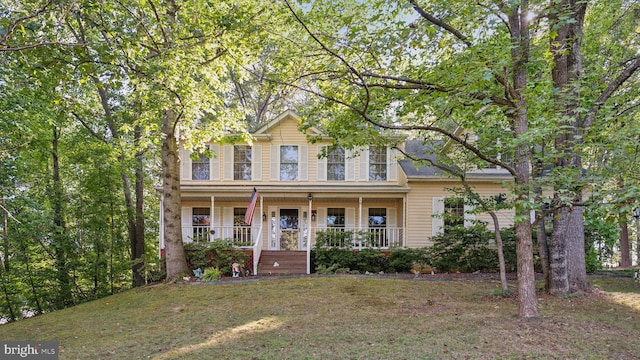 view of front of home featuring a porch and a front yard