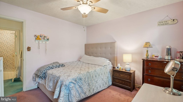 bedroom featuring light colored carpet and ceiling fan