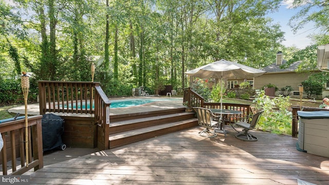 wooden terrace with grilling area