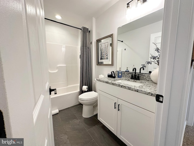 full bathroom with toilet, shower / bath combo, and vanity