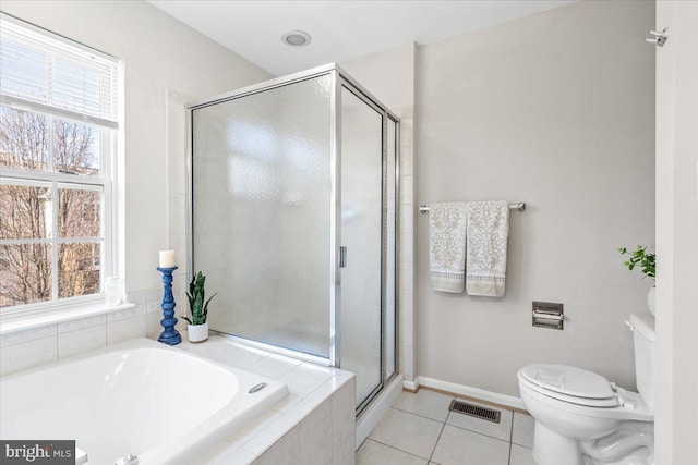 bathroom with toilet, independent shower and bath, and tile patterned flooring