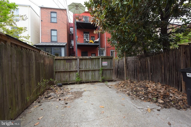 back of house with fence private yard