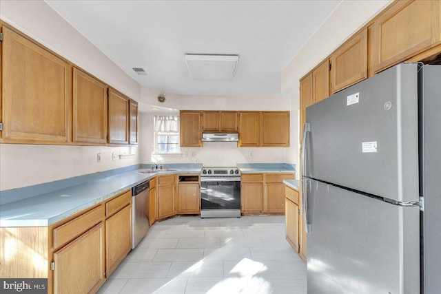 kitchen featuring stainless steel appliances and sink