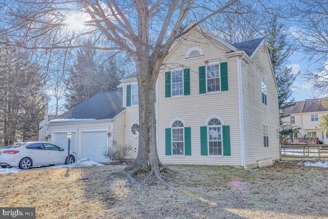 view of front of property featuring a garage