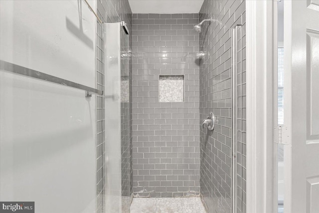 bathroom featuring an enclosed shower