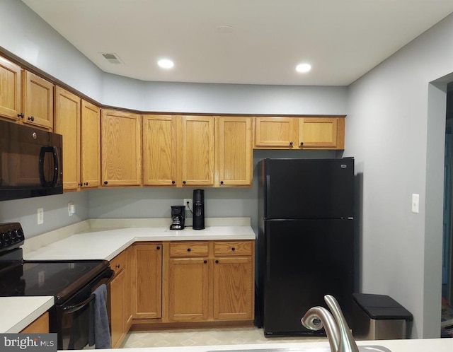 kitchen featuring black appliances