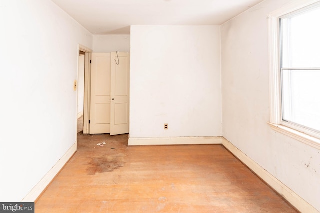 spare room with plenty of natural light