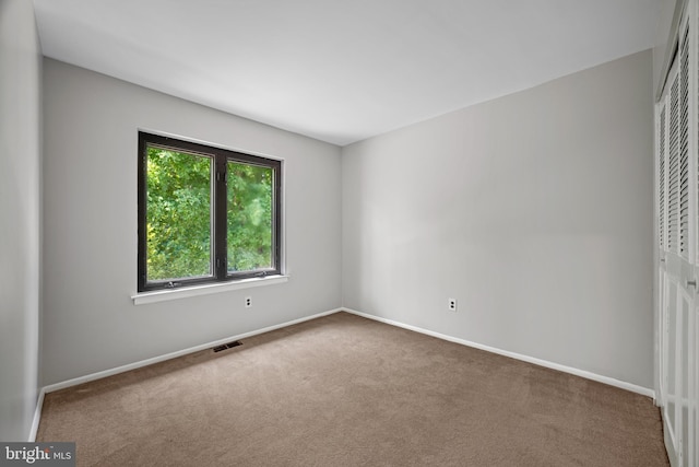 view of carpeted spare room