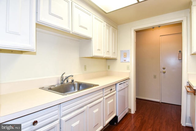 kitchen with sink, dishwasher, white cabinetry, and dark wood-type flooring