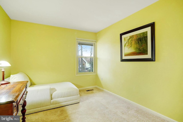 sitting room with light carpet